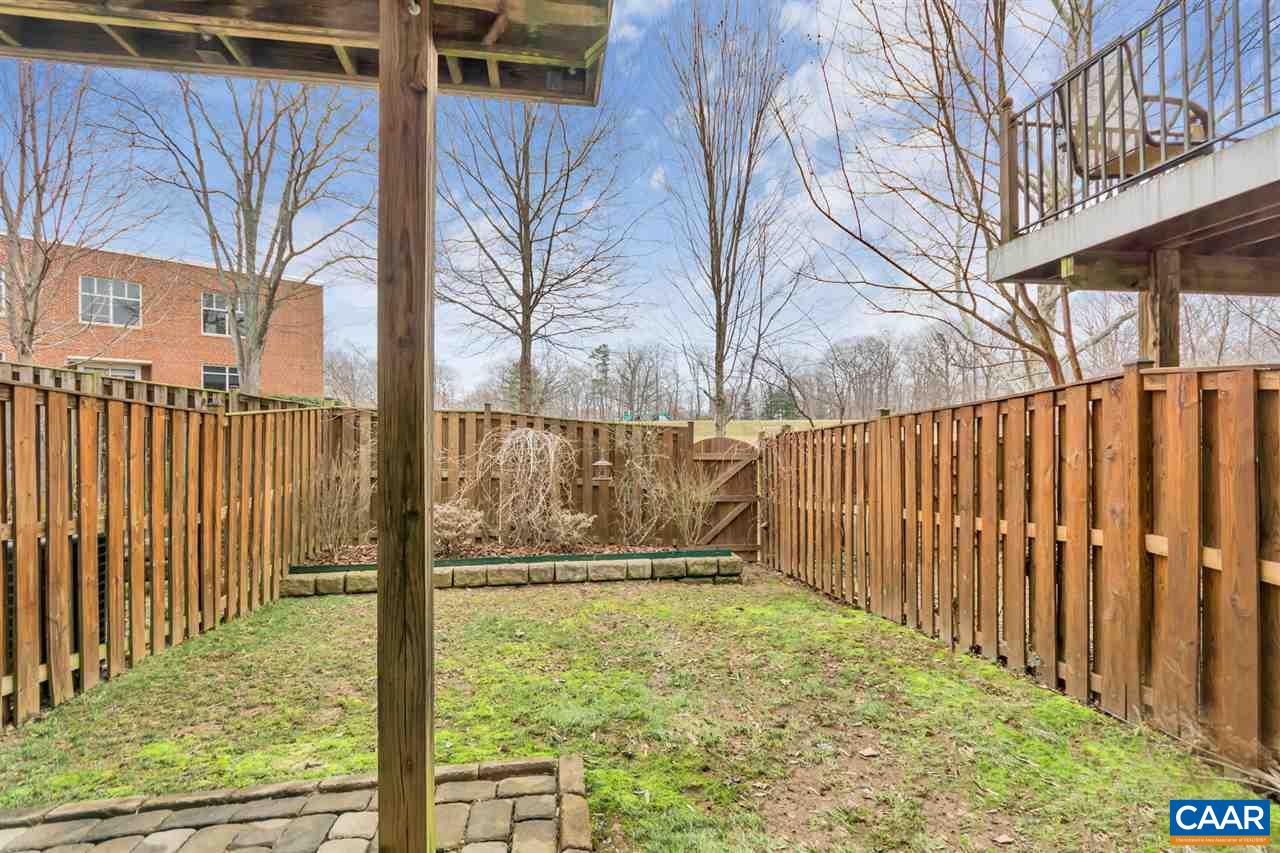 829 Rainier Road Charlottesville, VA 22903 - Photo 16 of 16 a view of a backyard with wooden fence