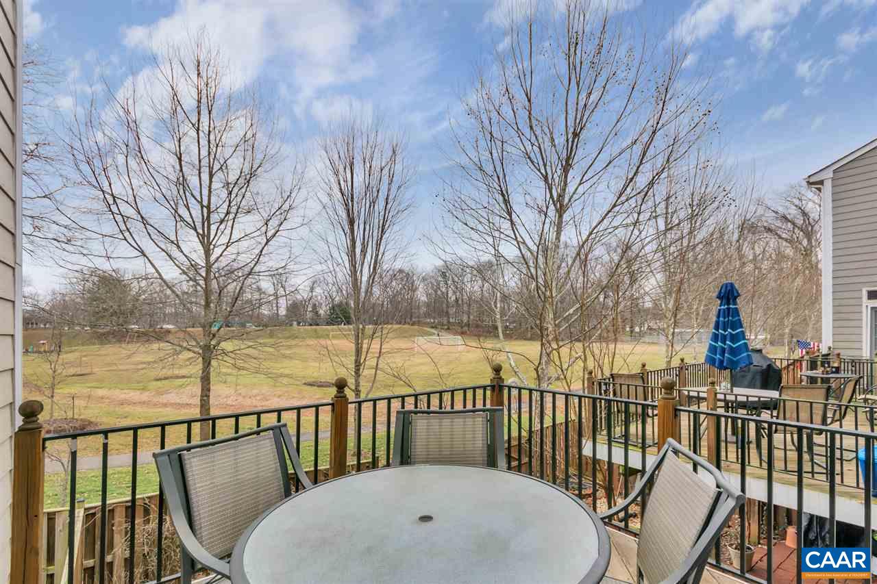 829 Rainier Road Charlottesville, VA 22903 - Photo 2 of 16 a view of a roof deck with wooden floor and fence