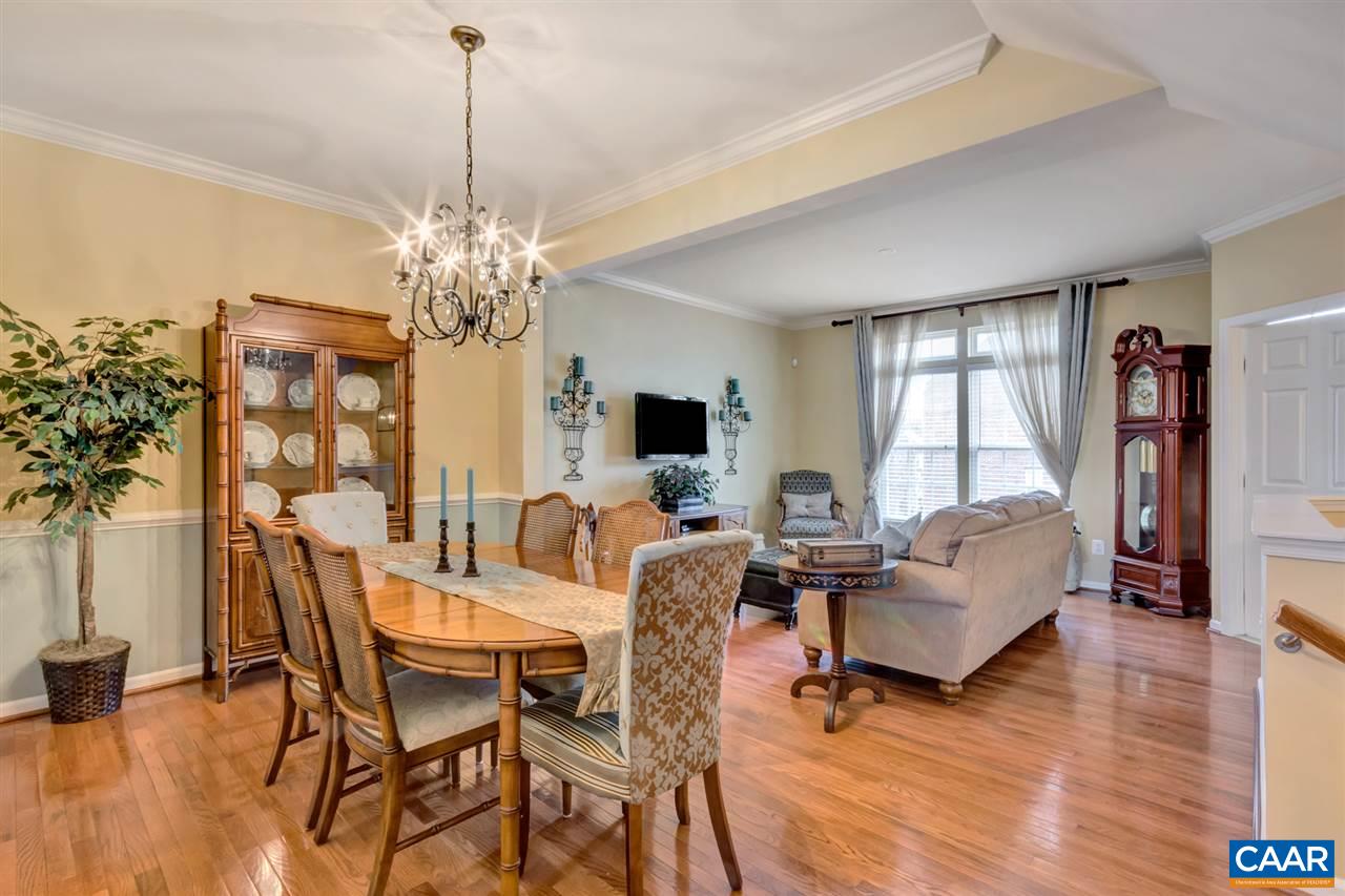 829 Rainier Road Charlottesville, VA 22903 - Photo 5 of 16 a view of a dining room with furniture and wooden floor