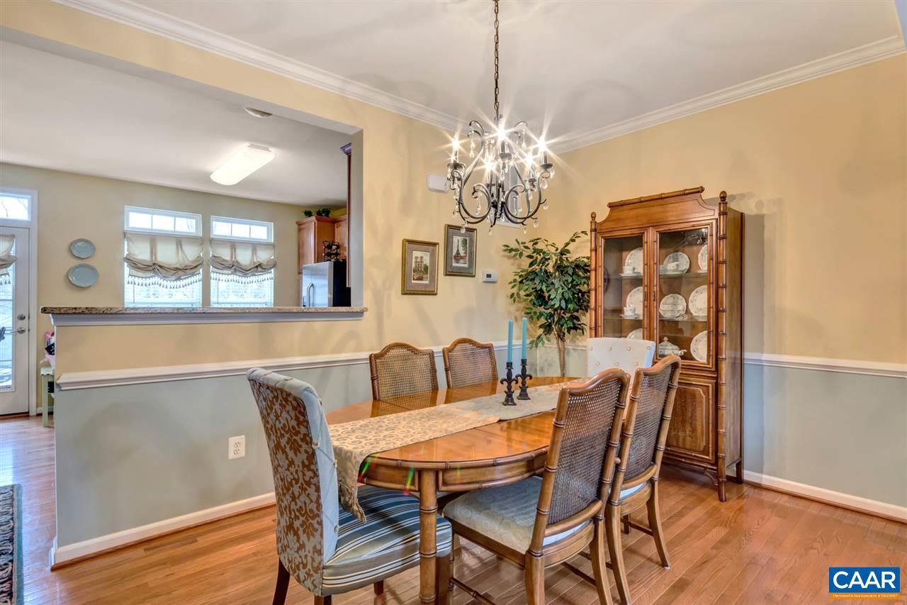 829 Rainier Road Charlottesville, VA 22903 - Photo 6 of 16 a view of a dining room with furniture window and wooden floor