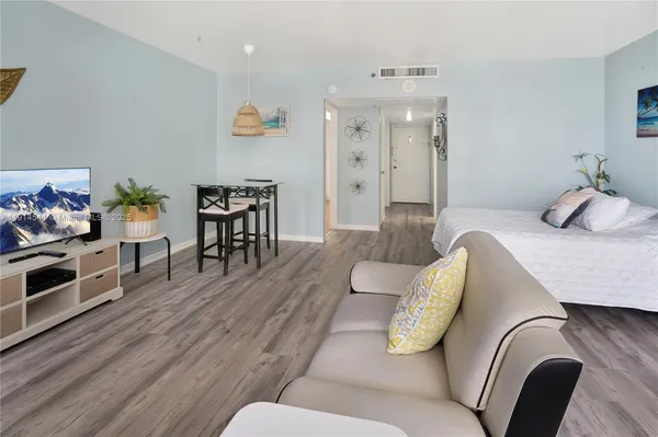 a bathroom with a shower and a toilet