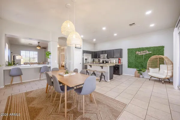 a view of a dining room with furniture