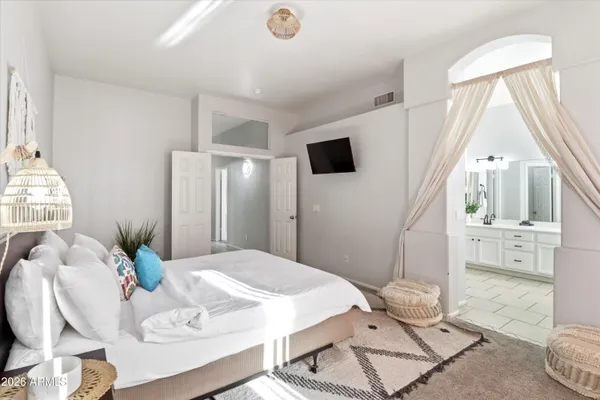 a front view of house with yard and outdoor seating