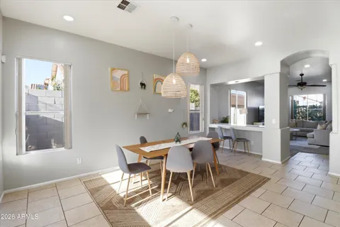 a view of a dining room with furniture