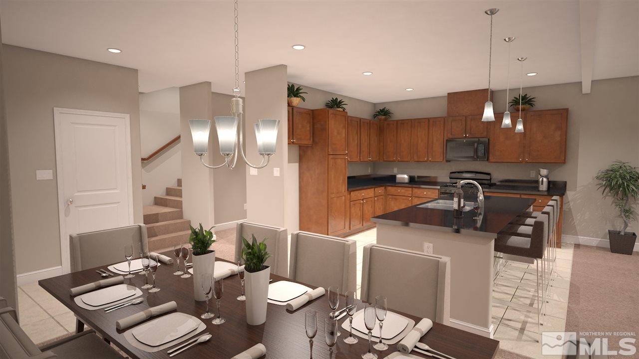 1760 Dark Horse Road, Unit C Reno, NV 89521 - Photo 3 of 15 a kitchen with a sink a stove a dining table and chairs