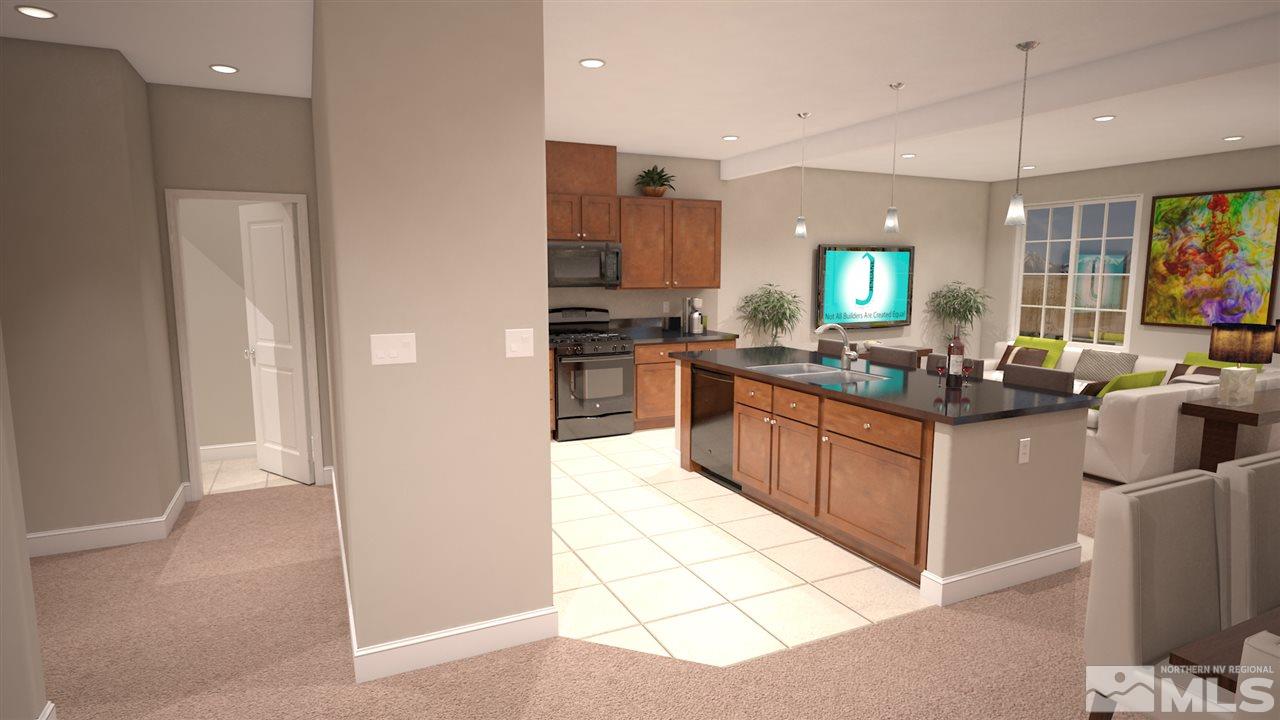 1760 Dark Horse Road, Unit C Reno, NV 89521 - Photo 4 of 15 a kitchen with stainless steel appliances granite countertop a stove top oven a sink a counter top space and cabinets