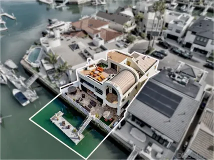 an aerial view of a house with a floor to ceiling window