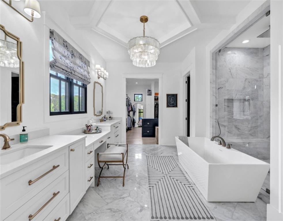 1560 Howell Bridge Road Ball Ground, GA 30107 - Photo 7 of 14 a spacious en suite bathroom with a double sink shower and mirror