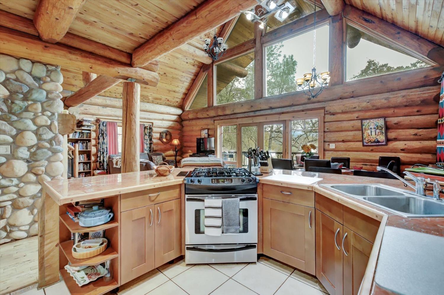 a kitchen with a stove and cabinets