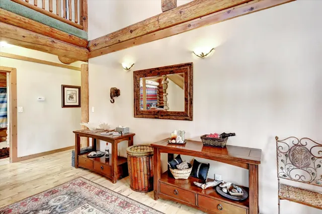 a kitchen with a refrigerator and a stove