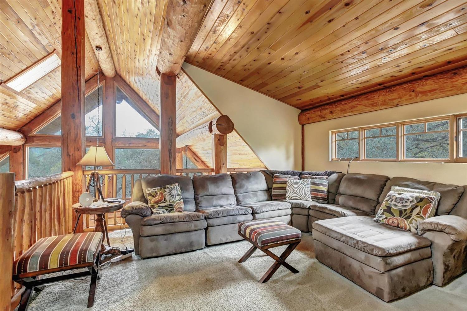 9844 Township Road Browns Valley, CA 95918 - Photo 19 of 35 a balcony with furniture and a large window