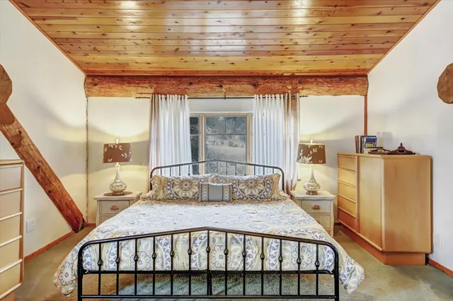 a bathroom with a tub sink toilet and mirror