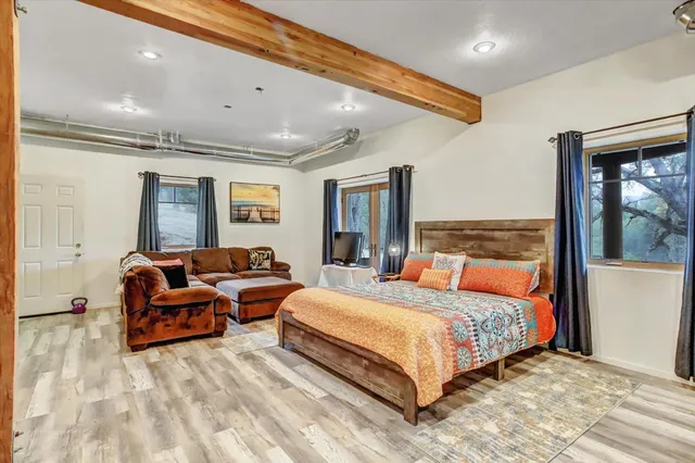 a view of a livingroom with furniture and empty room