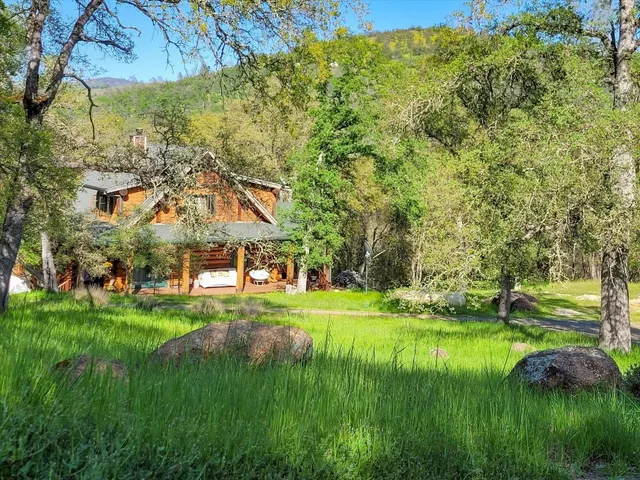 a view of a garden with a lake