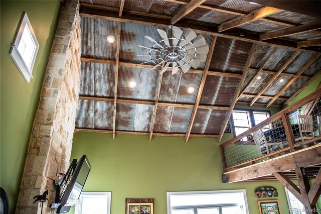 a view of a room with racks on the wall