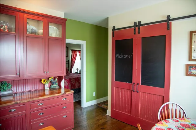 a bedroom with a bed and a closet