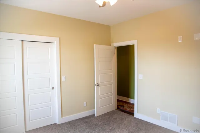 a view of a bathroom with a shower and a sink