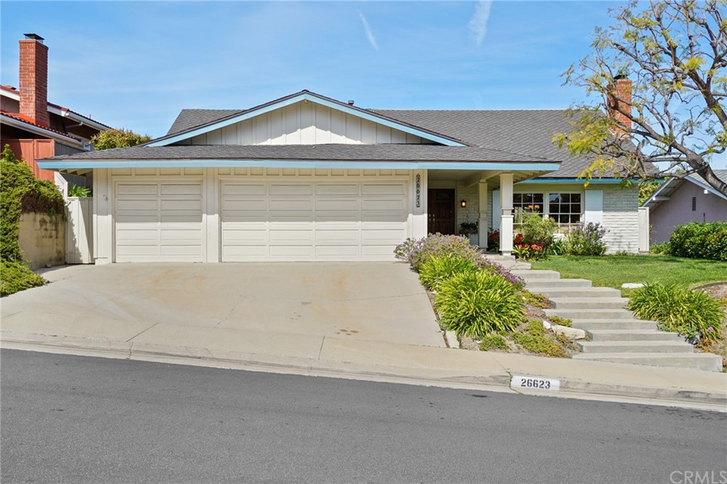 front view of a house with a small yard