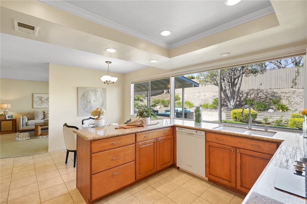 26623 Nokomis Road Rancho Palos Verdes, CA 90275 - Photo 13 of 42 a kitchen with a sink stove and cabinets