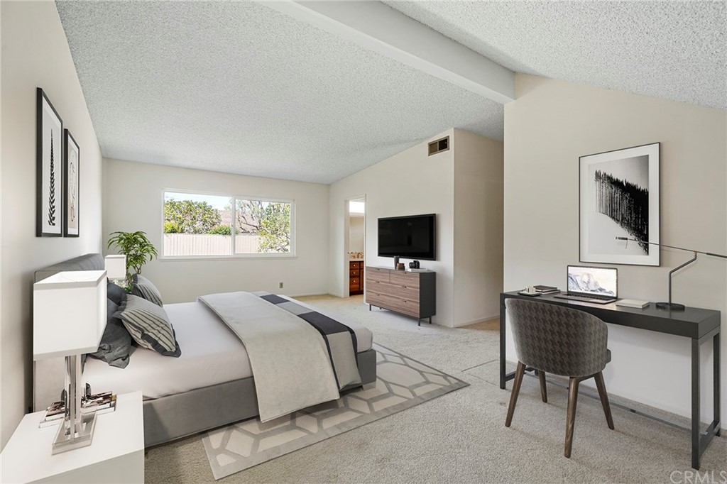 26623 Nokomis Road Rancho Palos Verdes, CA 90275 - Photo 23 of 42 a bedroom with a bed and a flat screen tv