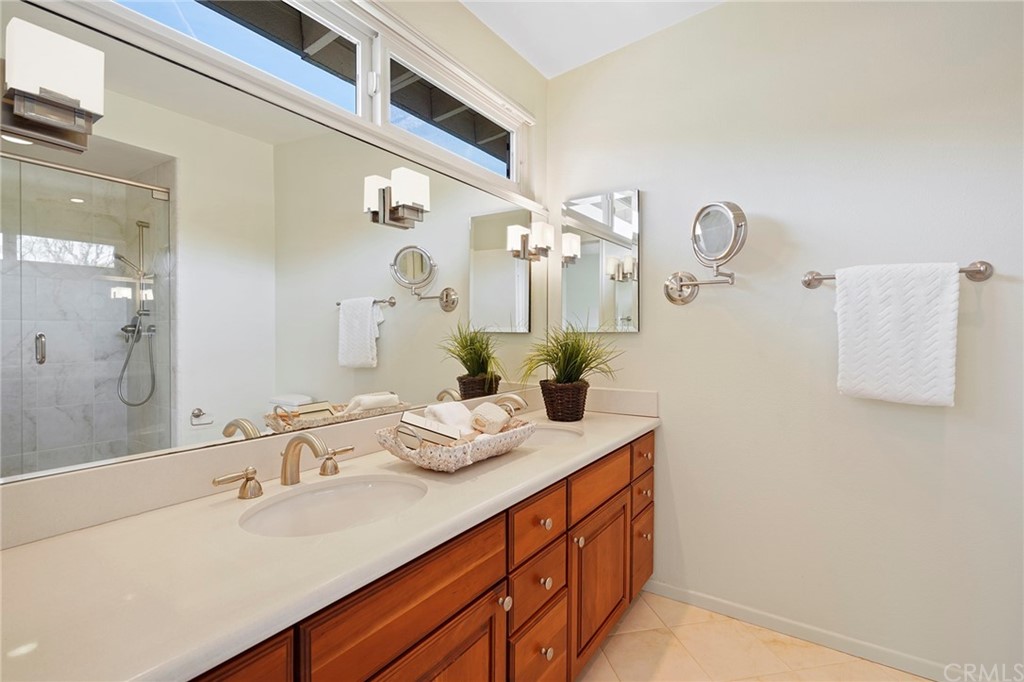 26623 Nokomis Road Rancho Palos Verdes, CA 90275 - Photo 25 of 42 a bathroom with a sink and a mirror