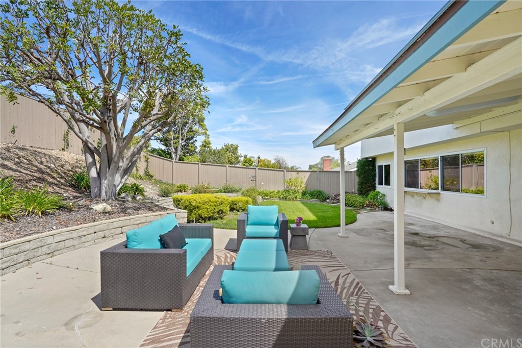 26623 Nokomis Road Rancho Palos Verdes, CA 90275 - Photo 34 of 42 a view of a patio with couches table and chairs and potted plants