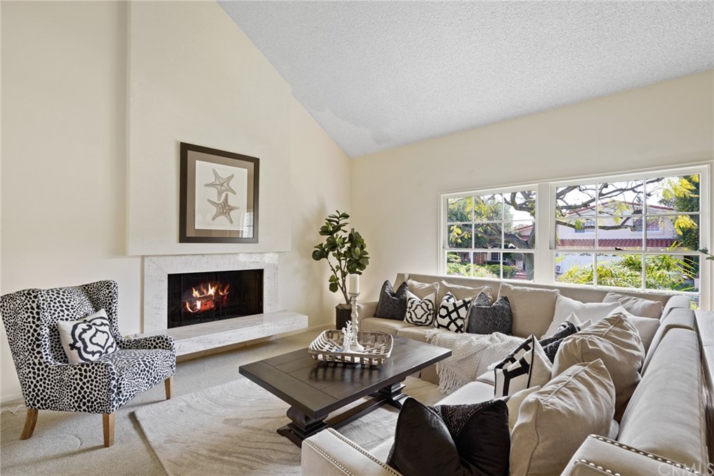 26623 Nokomis Road Rancho Palos Verdes, CA 90275 - Photo 6 of 42 a living room with furniture and a fireplace