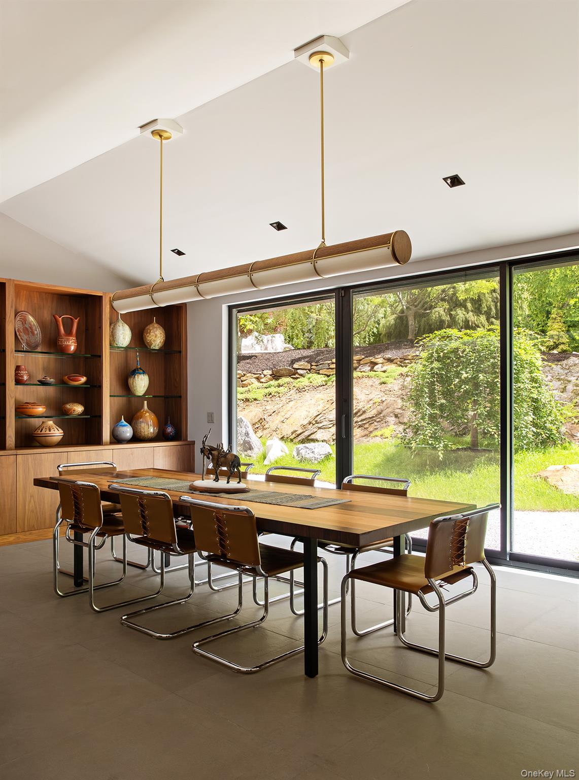 49 Indian Hill Road Pound Ridge, NY 10576 - Photo 13 of 34 a view of a dining room with furniture window and outside view