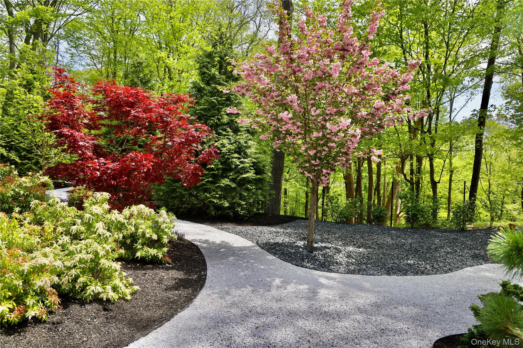 49 Indian Hill Road Pound Ridge, NY 10576 - Photo 27 of 34 a view of a garden with plants