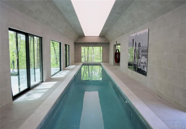 a view of swimming pool with a balcony