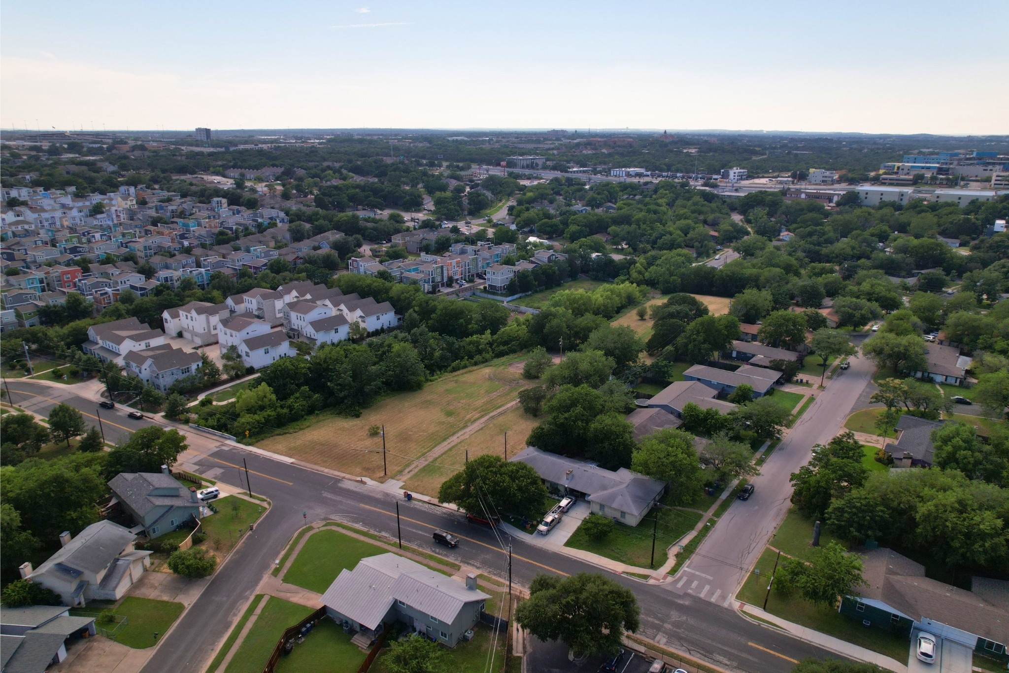 2610-2606 Metcalfe Road Austin, TX 78741 - Photo 18 of 20 An aerial perspective reveals a vibrant neighborhood with diverse homes and abundant green spaces.