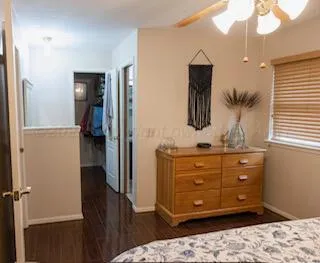a bathroom with a sink vanity and mirror