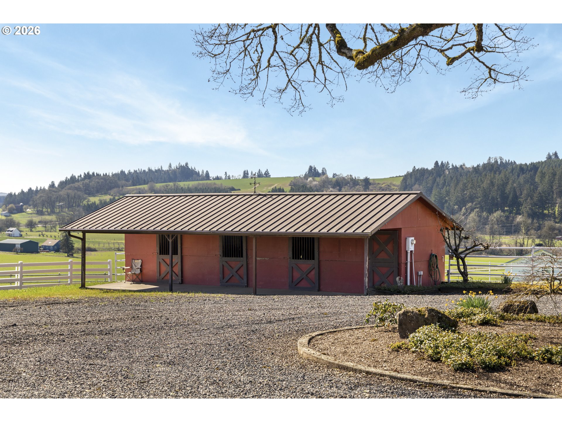 17795 Northeast Laughlin Road Yamhill, OR 97148 - Photo 26 of 48 a front view of a house with a garden