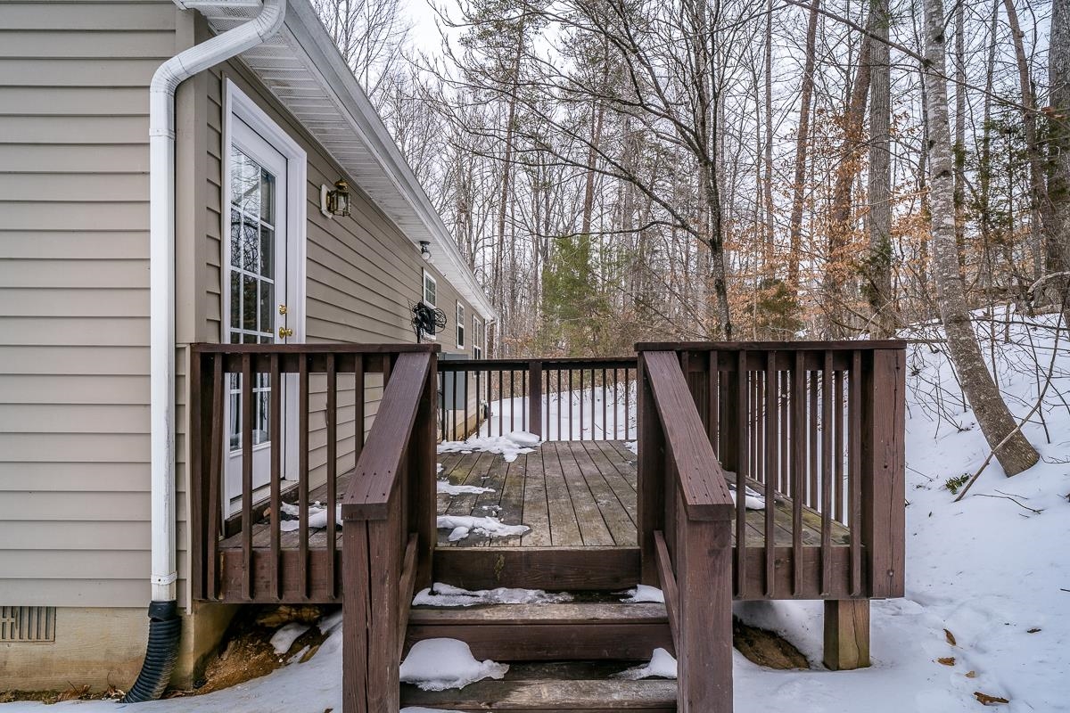 37 Hatchechubee Road Palmyra, VA 22963 - Photo 25 of 27 a view of staircase with railing and a potted plant