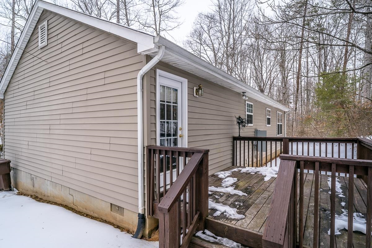 37 Hatchechubee Road Palmyra, VA 22963 - Photo 26 of 27 a view of a balcony with wooden fence