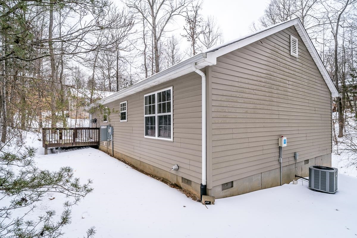 37 Hatchechubee Road Palmyra, VA 22963 - Photo 27 of 27 a view of a house with a yard and garage