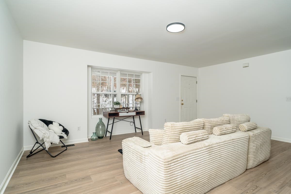 37 Hatchechubee Road Palmyra, VA 22963 - Photo 7 of 27 a living room with furniture and a table