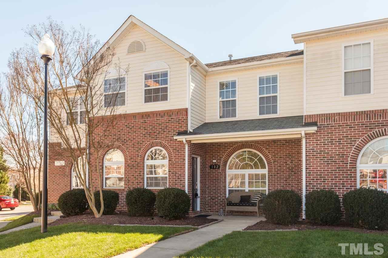 2120 Piney Brook Road, Unit 102 Raleigh, NC 27614 - Photo 2 of 24 a front view of a house with a garden