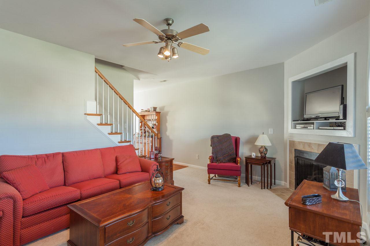2120 Piney Brook Road, Unit 102 Raleigh, NC 27614 - Photo 7 of 24 a living room with furniture