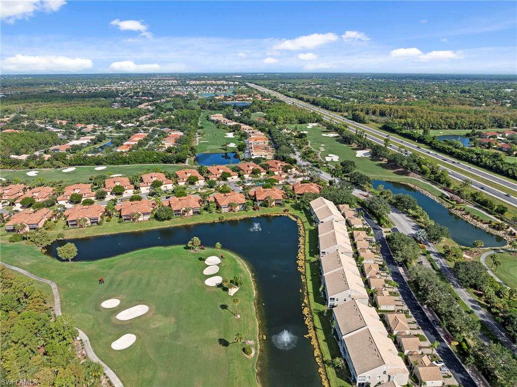 5720 Grande Reserve Way, Unit 2004 Naples, FL 34110 - Photo 23 of 27 an aerial view of a residential houses with outdoor space and street view