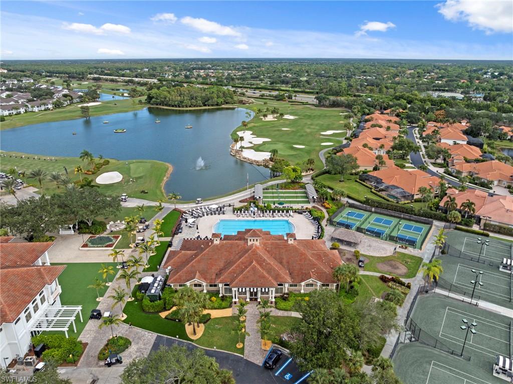 5720 Grande Reserve Way, Unit 2004 Naples, FL 34110 - Photo 26 of 27 an aerial view of residential houses with outdoor space and lake view