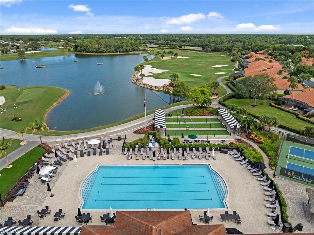 5720 Grande Reserve Way, Unit 2004 Naples, FL 34110 - Photo 27 of 27 a view of a lake with a yard