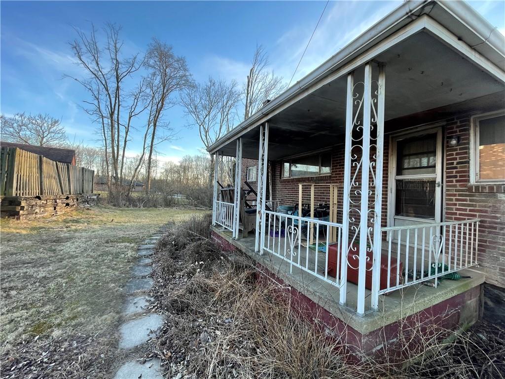 104 Colbaugh Drive Trafford, PA 15085 - Photo 15 of 16 a view of a house with a yard