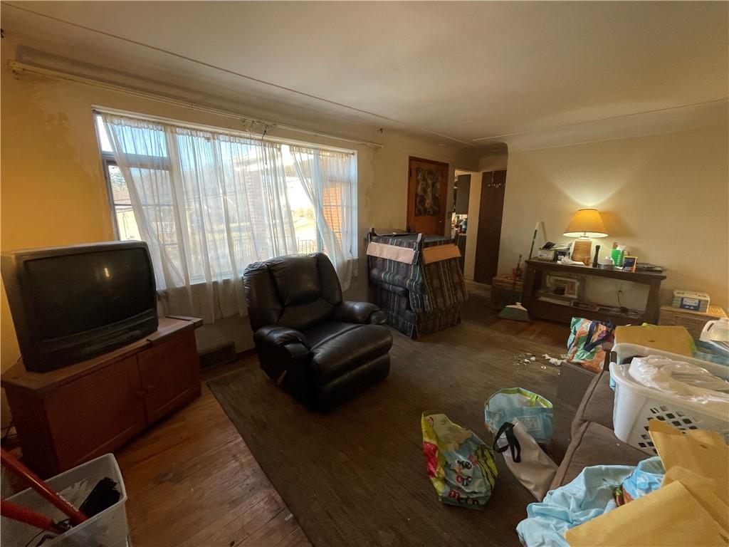 104 Colbaugh Drive Trafford, PA 15085 - Photo 7 of 16 a living room with furniture and a flat screen tv