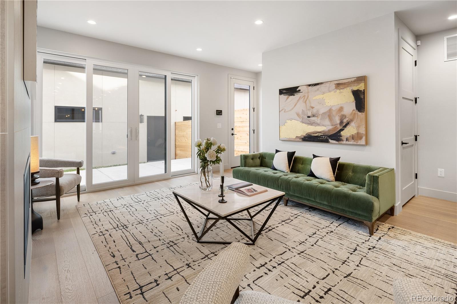 4572 North Raleigh Street Denver, CO 80212 - Photo 13 of 50 a living room with furniture and a rug