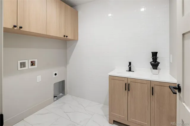 a bedroom with a bed and a chair