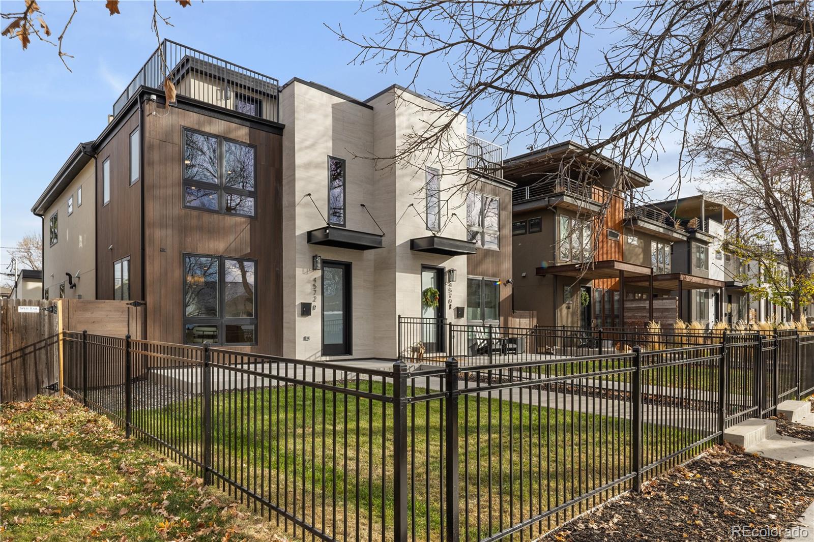 4572 North Raleigh Street Denver, CO 80212 - Photo 2 of 50 a view of a brick house with large windows
