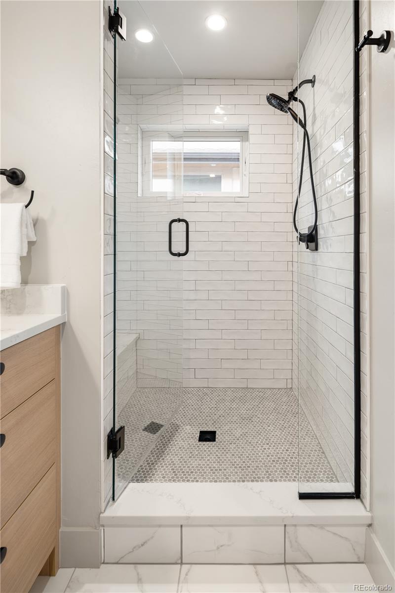 4572 North Raleigh Street Denver, CO 80212 - Photo 25 of 50 a bathroom with a shower