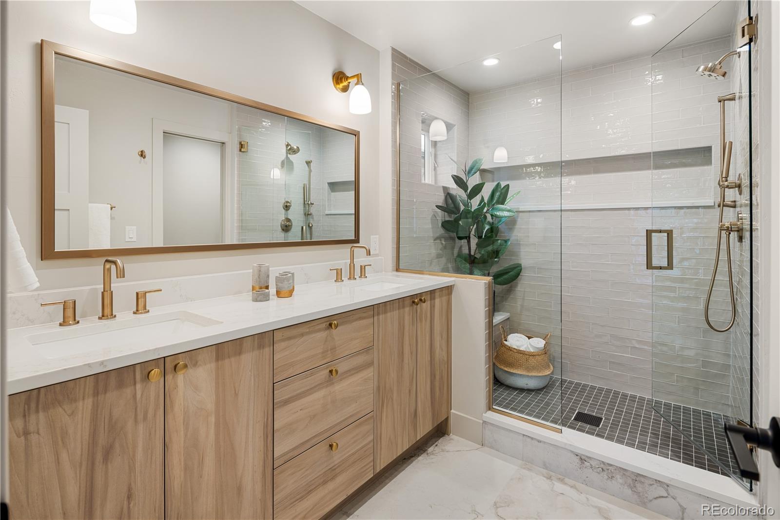4572 North Raleigh Street Denver, CO 80212 - Photo 29 of 50 a bathroom with a granite countertop sink a toilet and shower