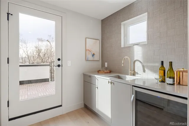 a view of a balcony with trees